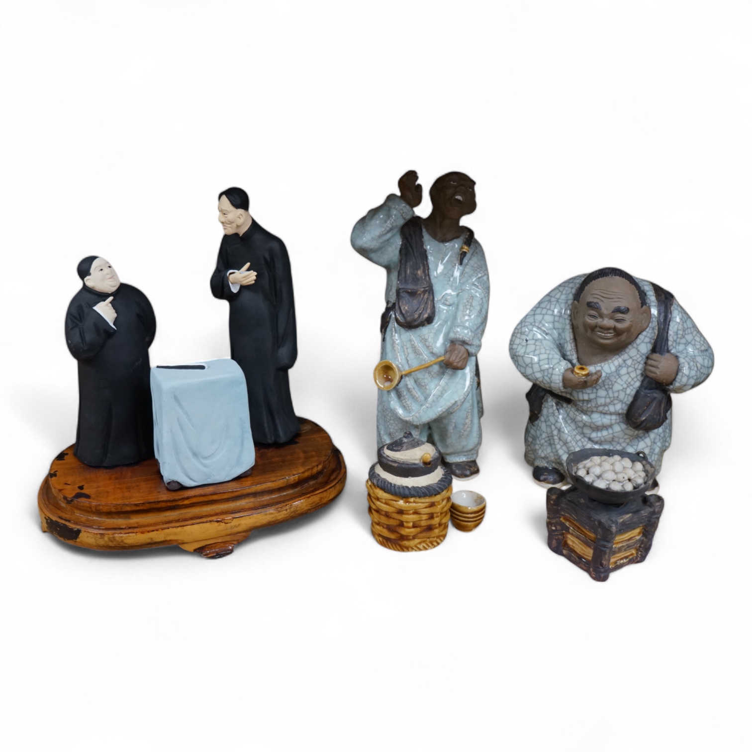 Two Chinese crackleglaze figures and baskets and two painted clay figures and stand, largest 28cm high. Condition - fair/good (8)